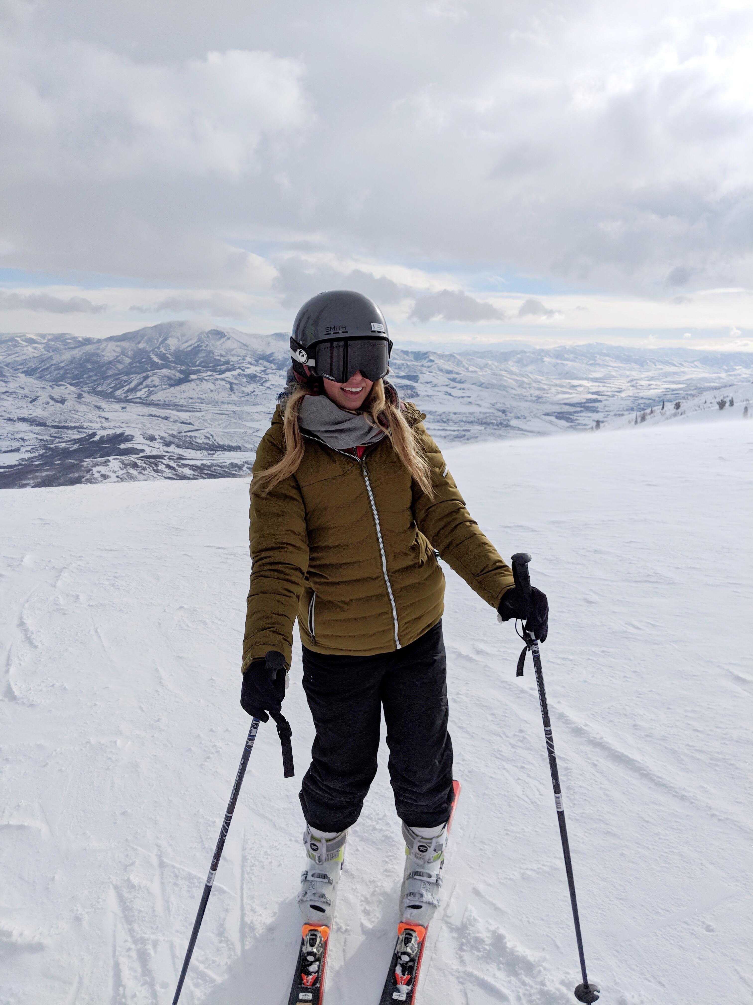Blonde woman skiing in the Salt Lake City mountains
