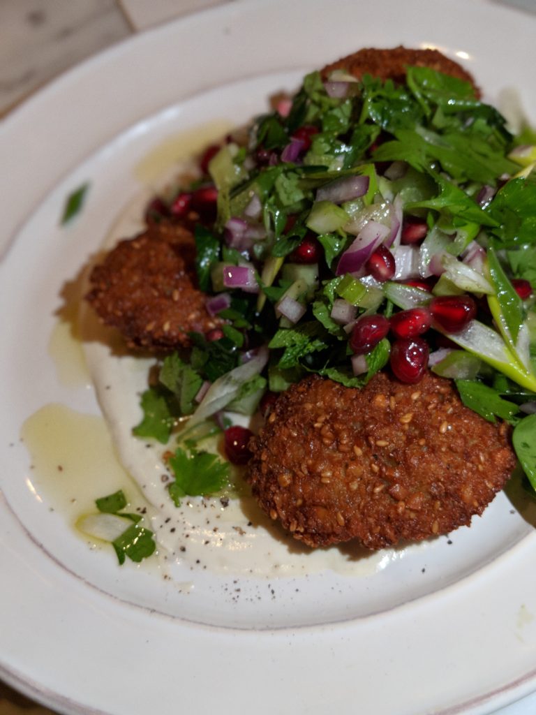 Falafel latkes with fresh herbs and pomegranate from shoo shoo nyc