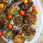 a platter filled with Baked Clams with White Wine Tarragon Butter