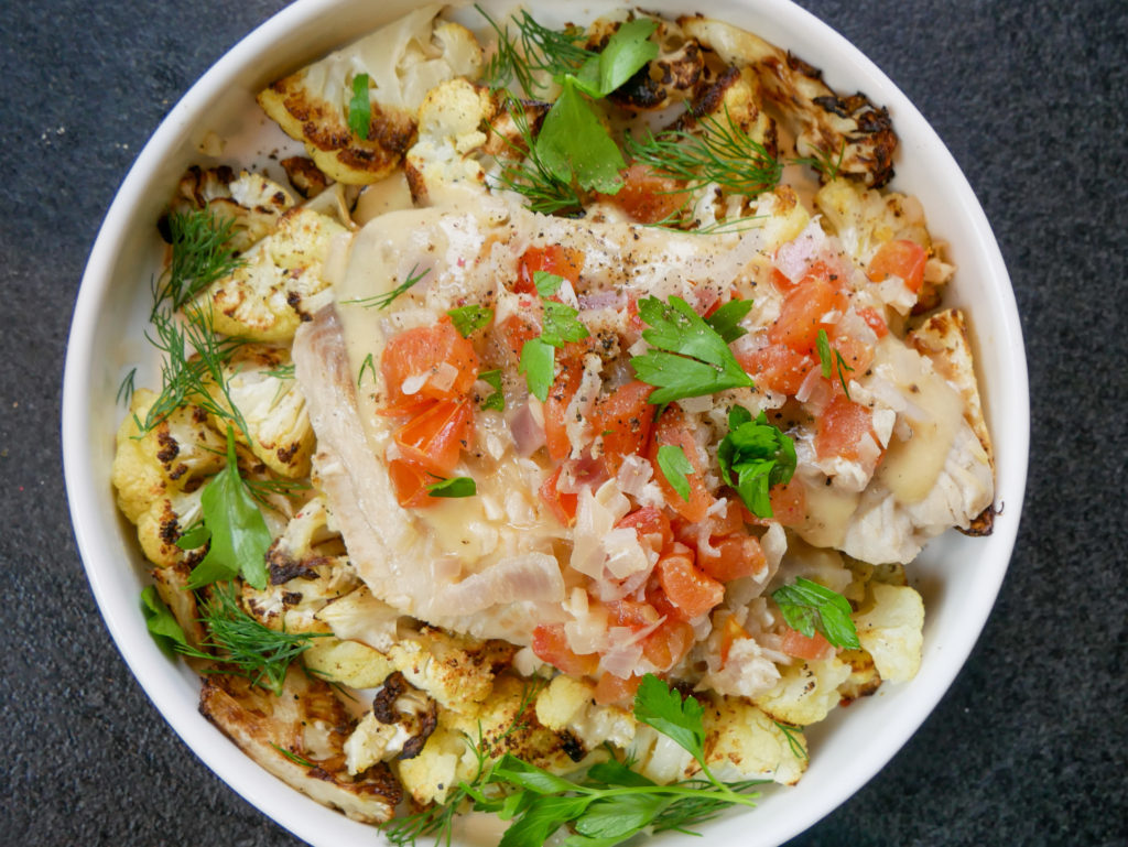 poached white fish in wine with cauliflower