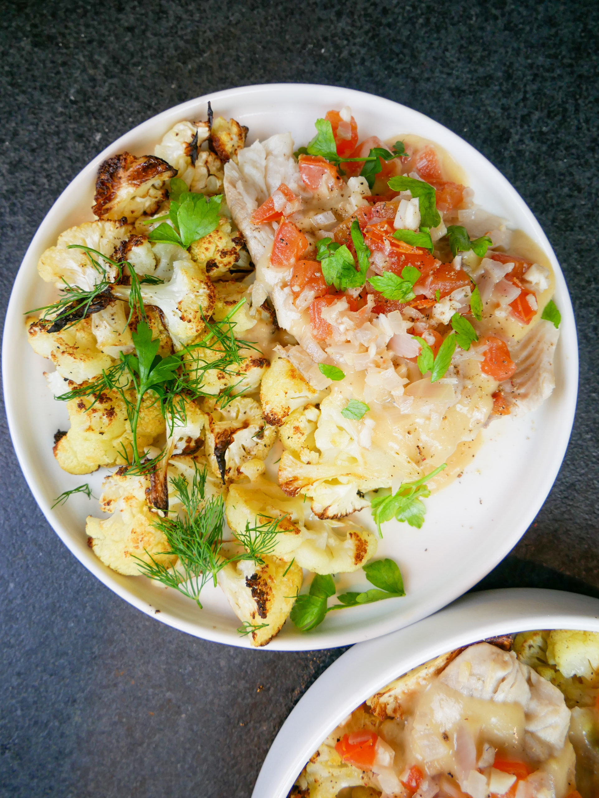 poached white fish in wine with cauliflower