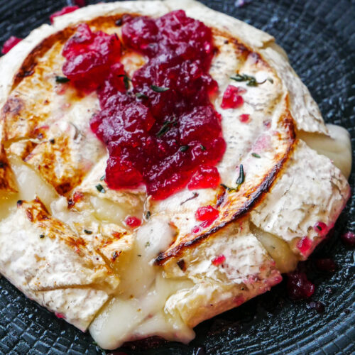 Baked Garlic Goat Brie with Cranberry, Rosemary and Thyme