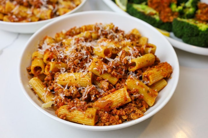 a bowl of pasta in a ground turkey red sauce