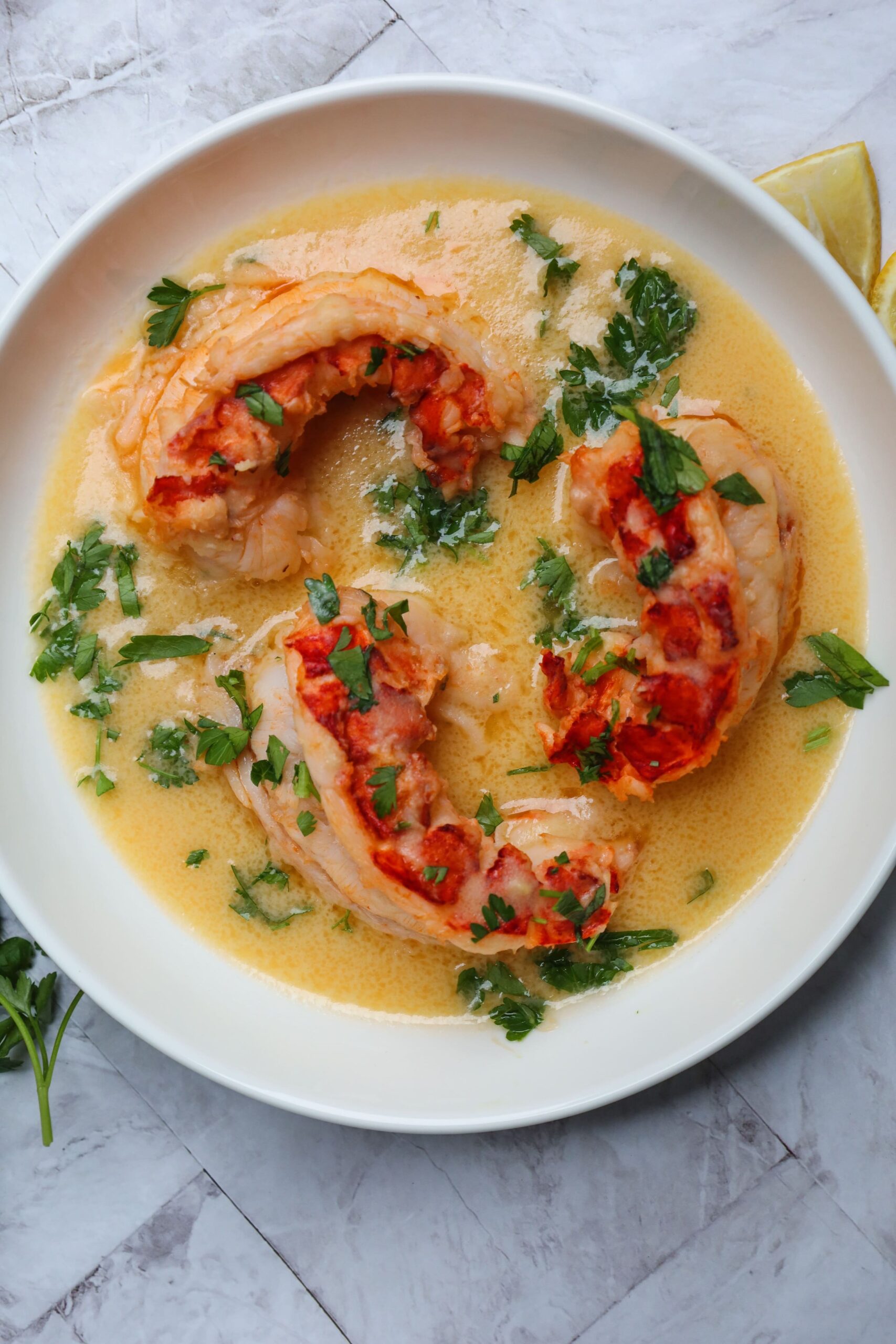 butter poached lobster tails with parsley