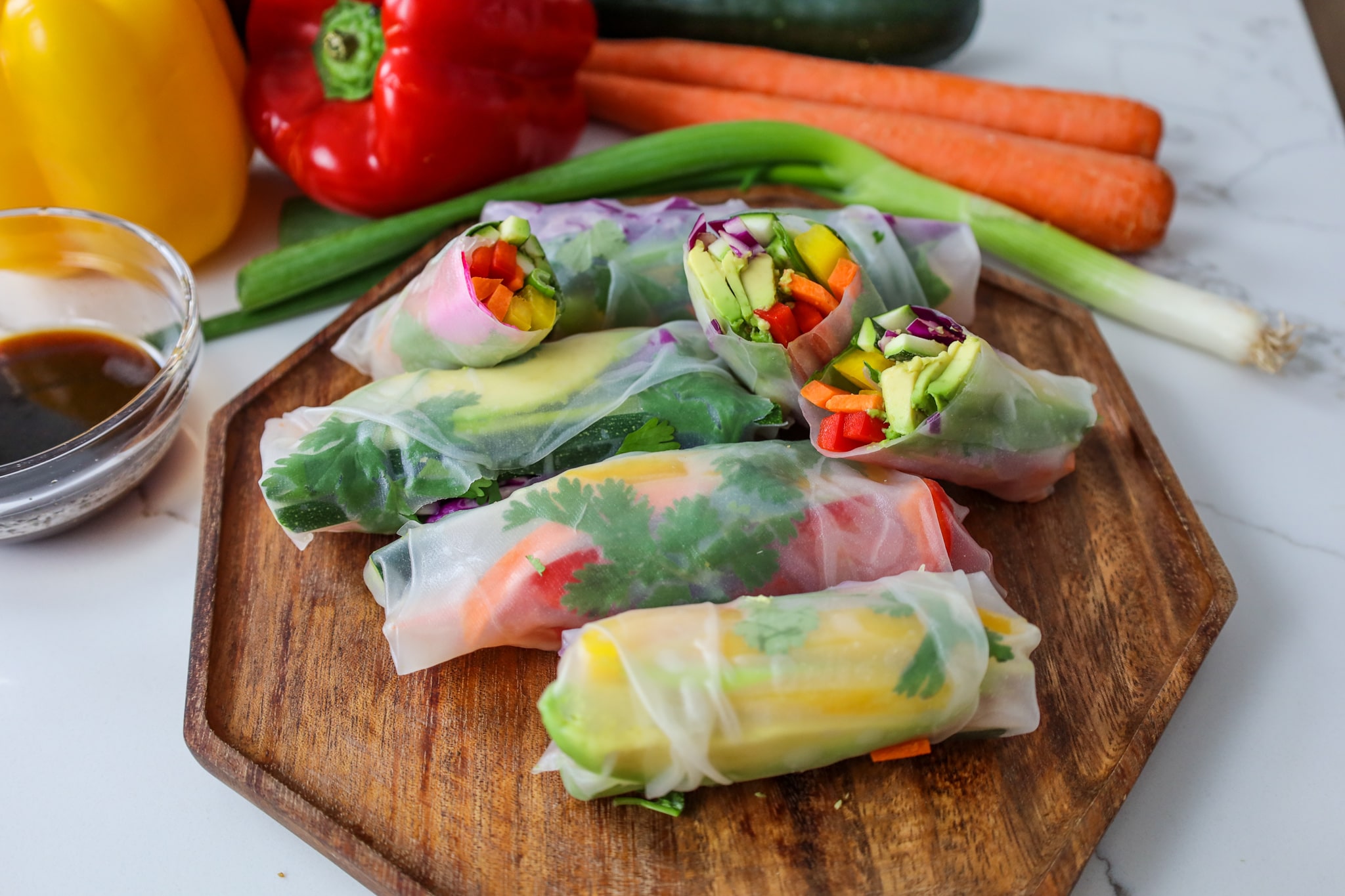 vegan rainbow veggie spring rolls with lemongrass sauce