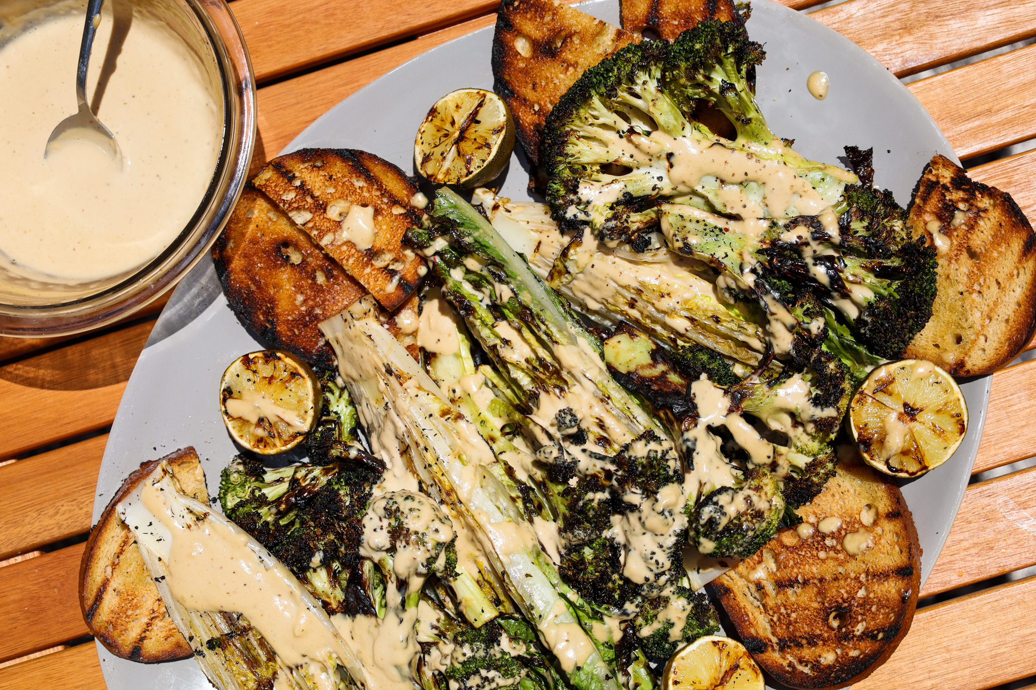 Grilled Romaine and Broccoli Tahini Caesar salad