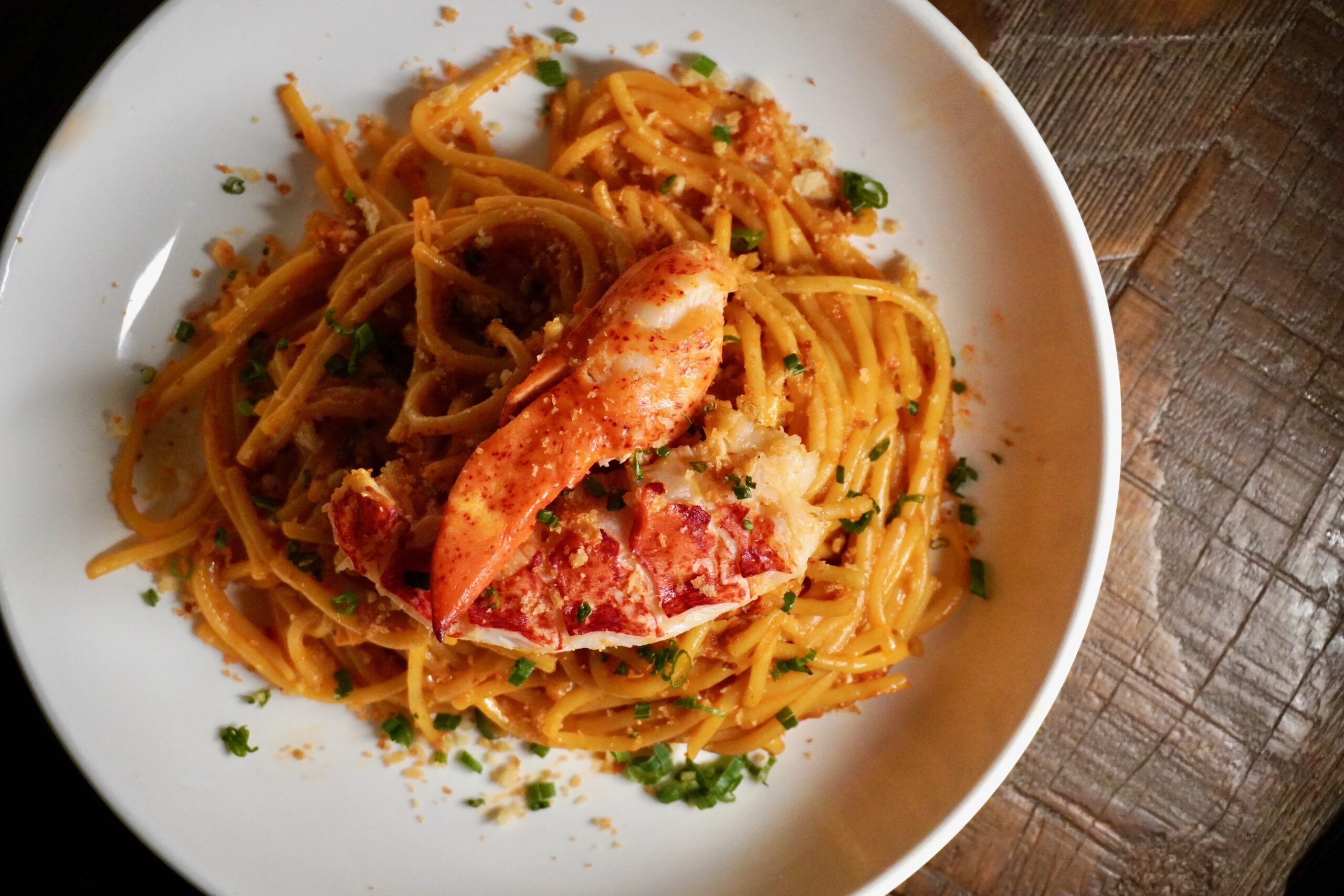 Creamy lobster spaghetti finished with chives and toasted breadcrumbs