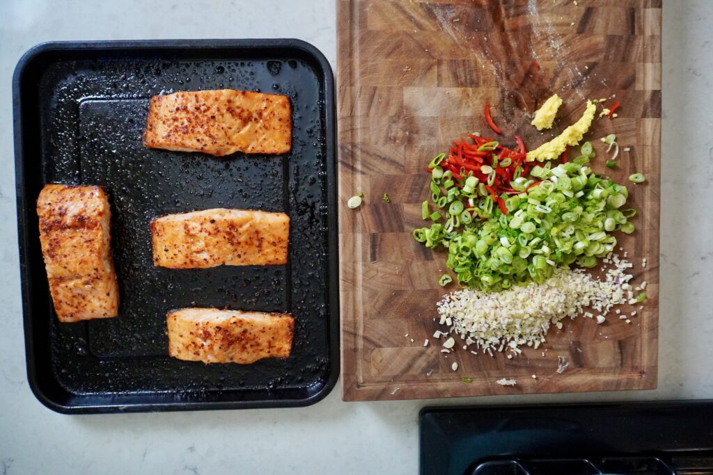 making salmon udon with lemongrass scallion oil