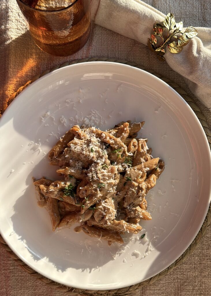 a bowl of Creamy porcini mushroom penne finished with thyme